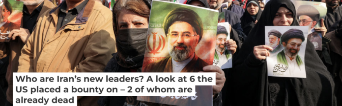 A woman poses with a picture of Iran’s new supreme leader, Ayatollah Mojtaba Khamenei, in central Tehran on March 9, 2026. Atta Kenare/AFP via Getty Images